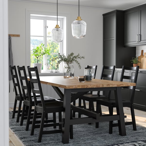 An acacia/black NORDVIKEN table and 6 chairs