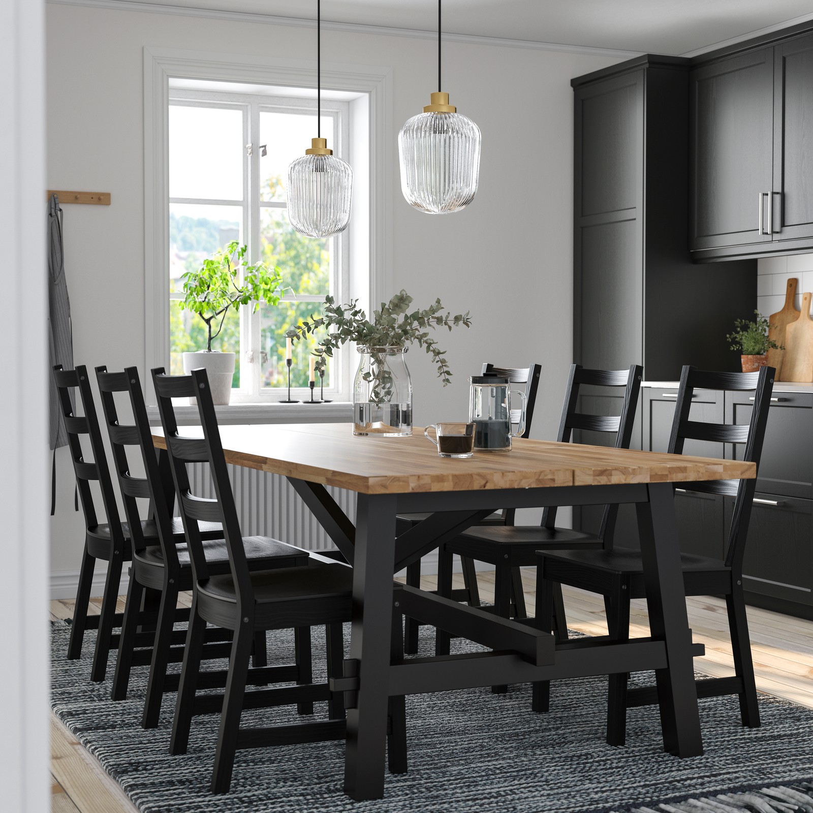 An acacia/black NORDVIKEN table and 6 chairs