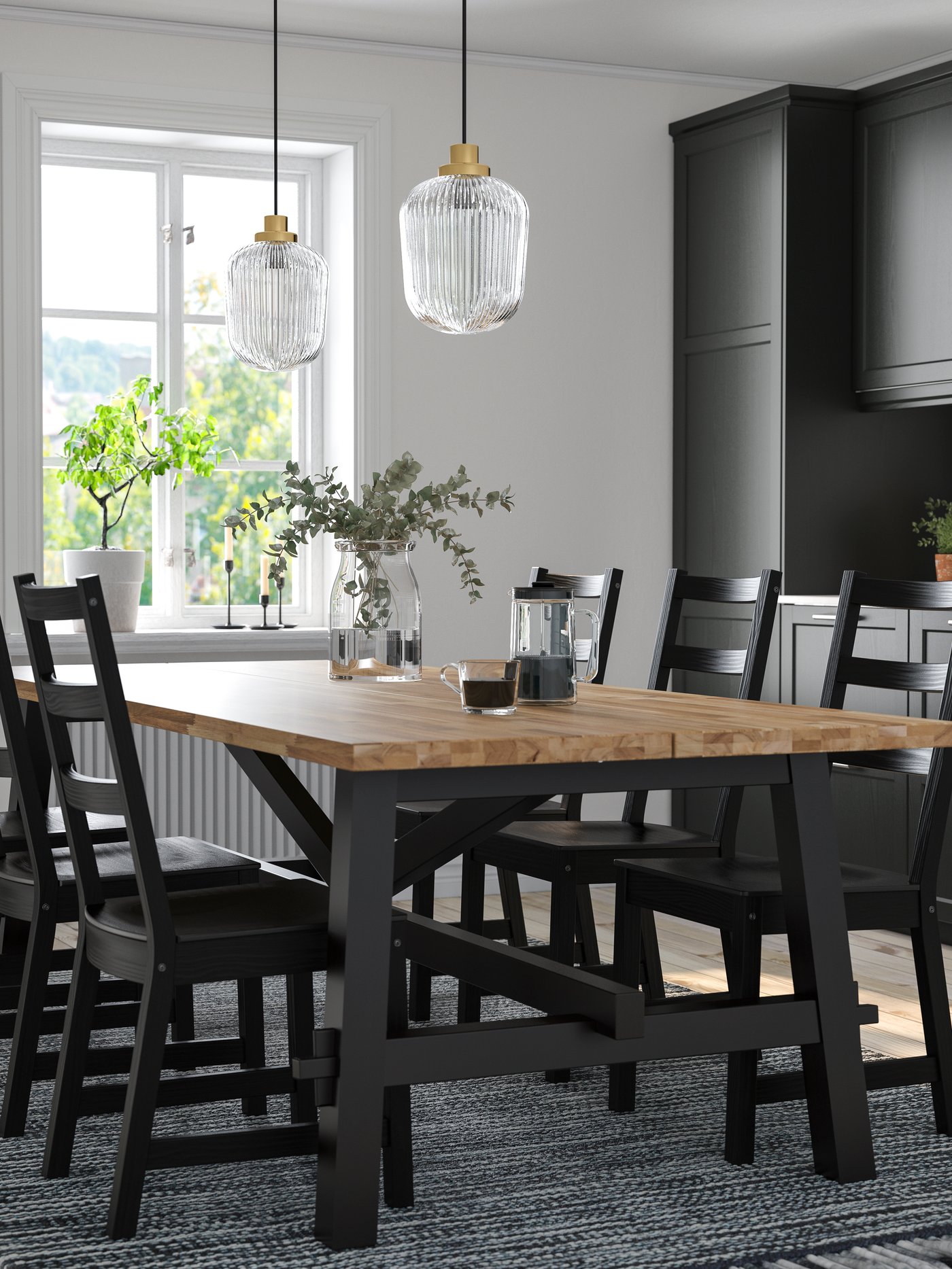 An acacia/black NORDVIKEN table and 6 chairs