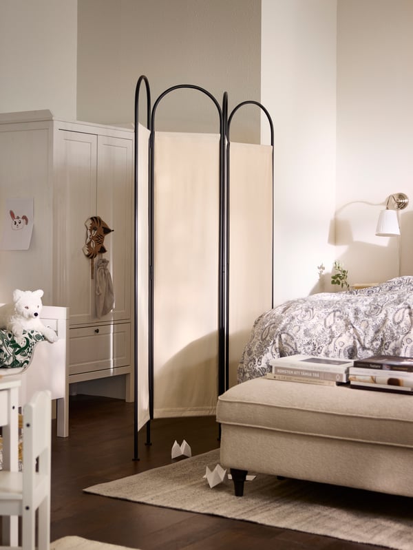 GRÅFJÄLLET room divider, standing between bed and children’s part of the room with SUNDVIK children’s wardrobe.