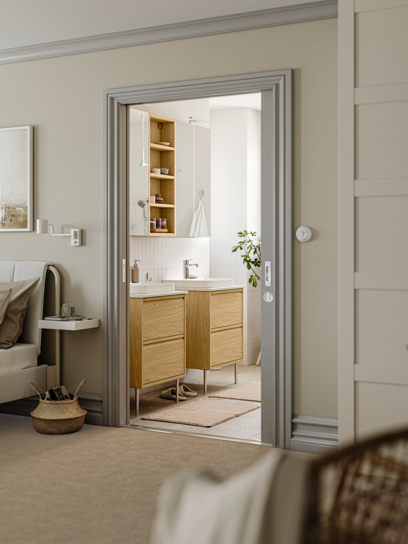 A mirror effect/mirror glass LETTAN mirror cabinet with doors in the bathroom