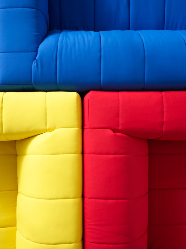 A Långban bright blue KLIPPAN cover for 2-seat sofa
