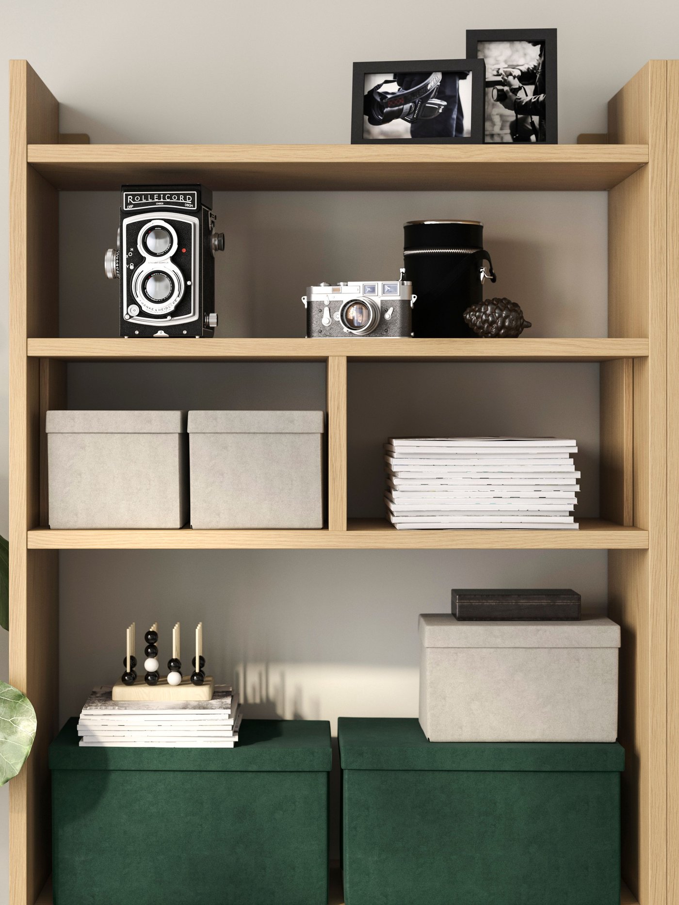 A velvet dark green GJÄTTA storage box with lid