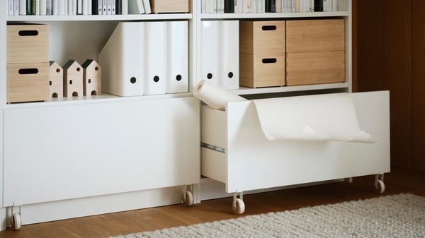 White BILLY bookcase with drawers.