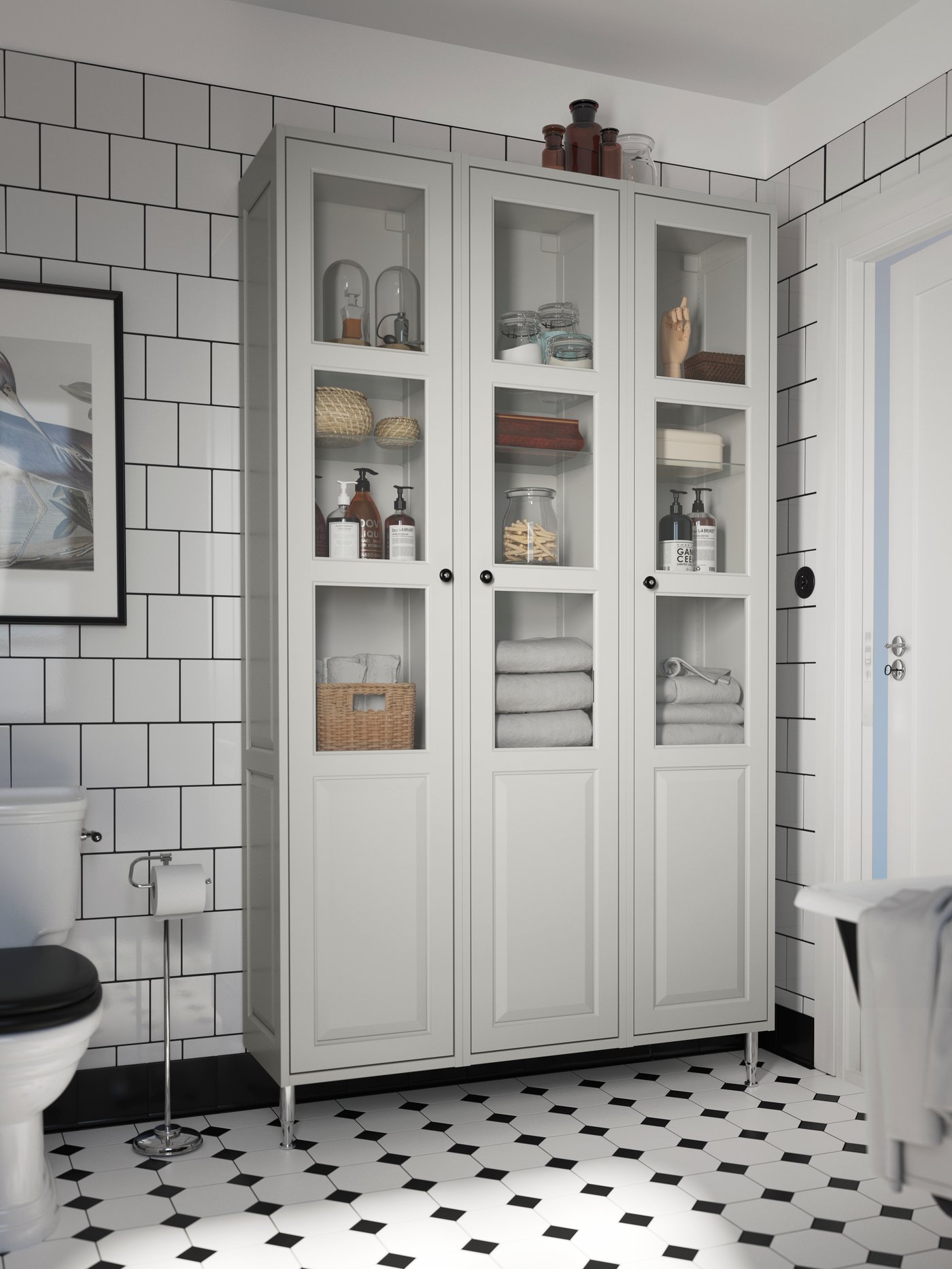 A chrome-plated BALUNGEN toilet roll holder in the bathroom