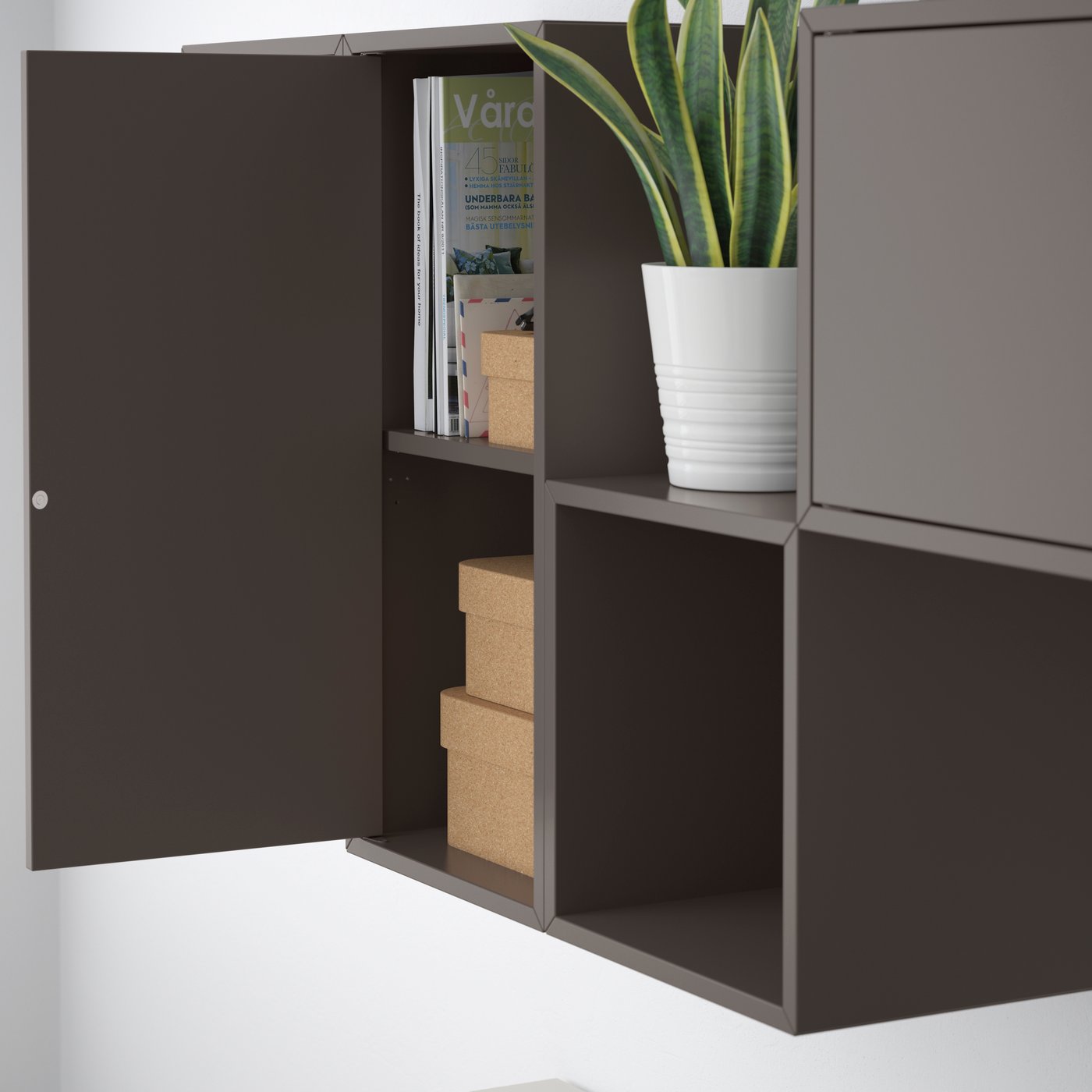 A dark grey EKET wall-mounted cabinet combination