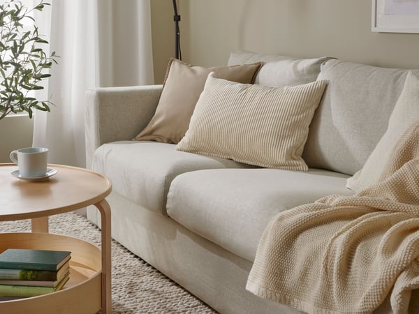 A Gunnared beige VIMLE 3-seat sofa in the living room