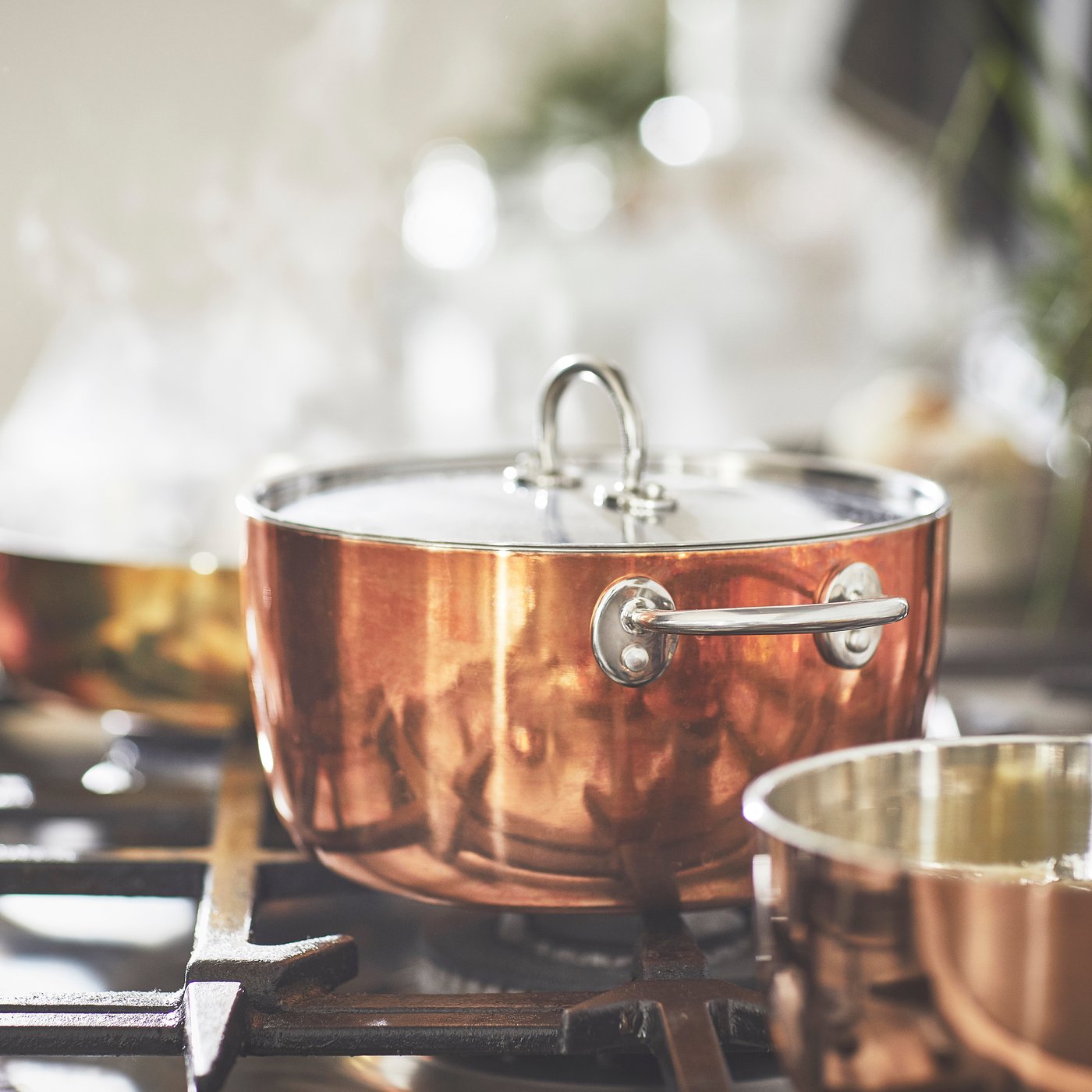 A copper/stainless steel FINMAT pot with lid