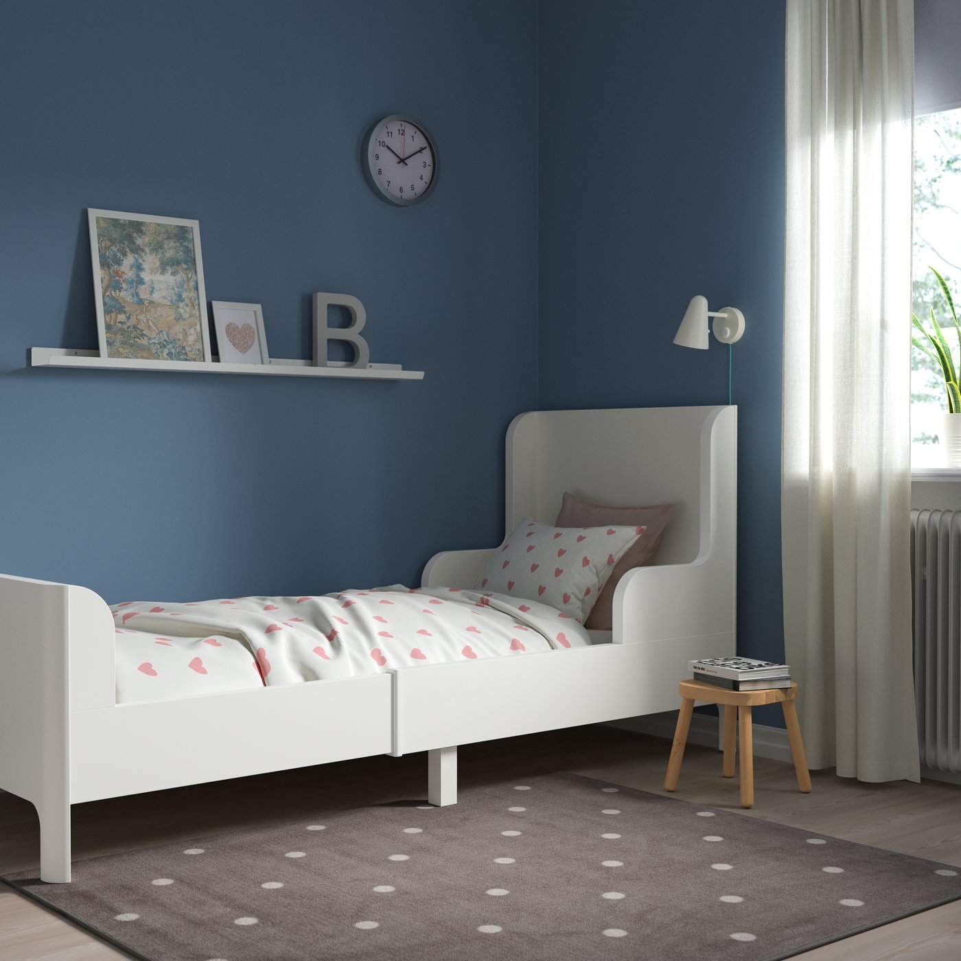 A white BUSUNGE extendable bed