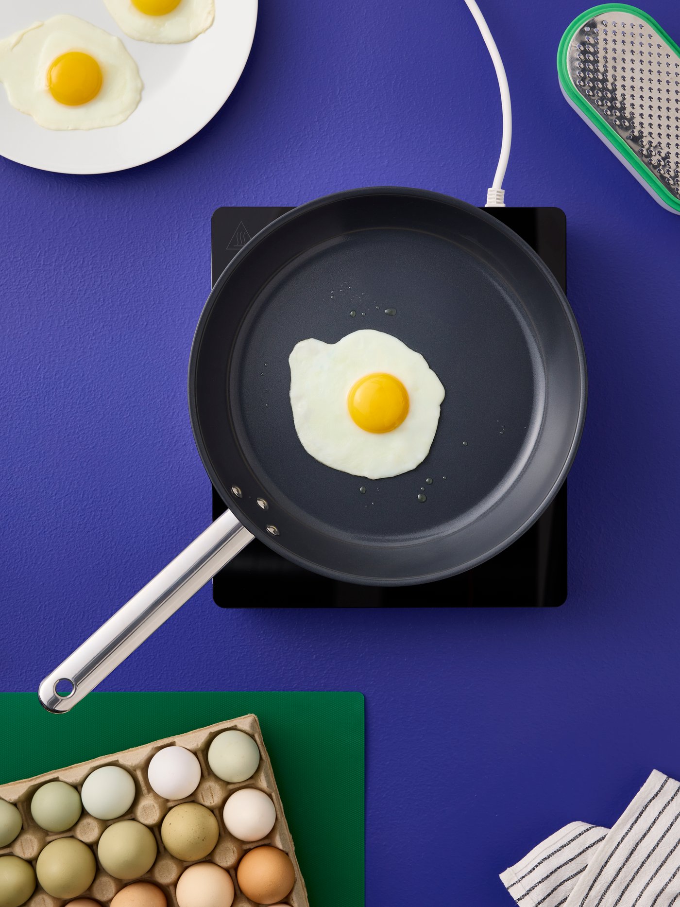 A green/bright green FINFÖRDELA bendable chopping board in the NA