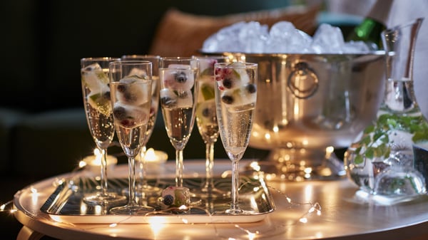 A clear glass SVALKA champagne glass