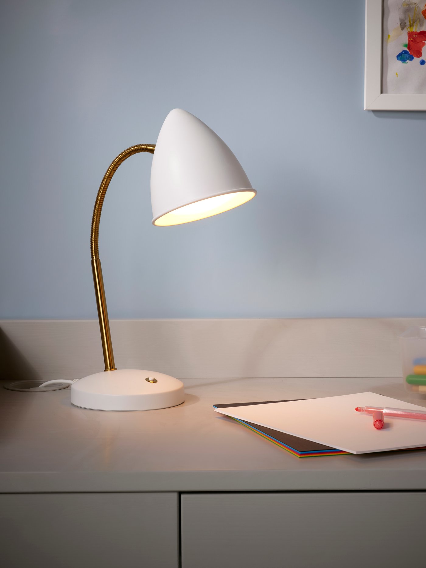 A white/brass-colour ISNÅLEN LED work lamp