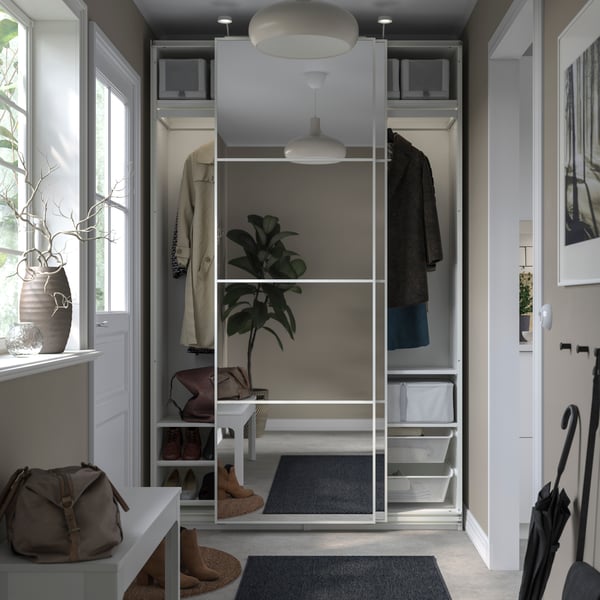 A white/mirror glass PAX wardrobe with sliding doors