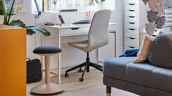 A grey ODDLAUG sound absorbing panel in the home office