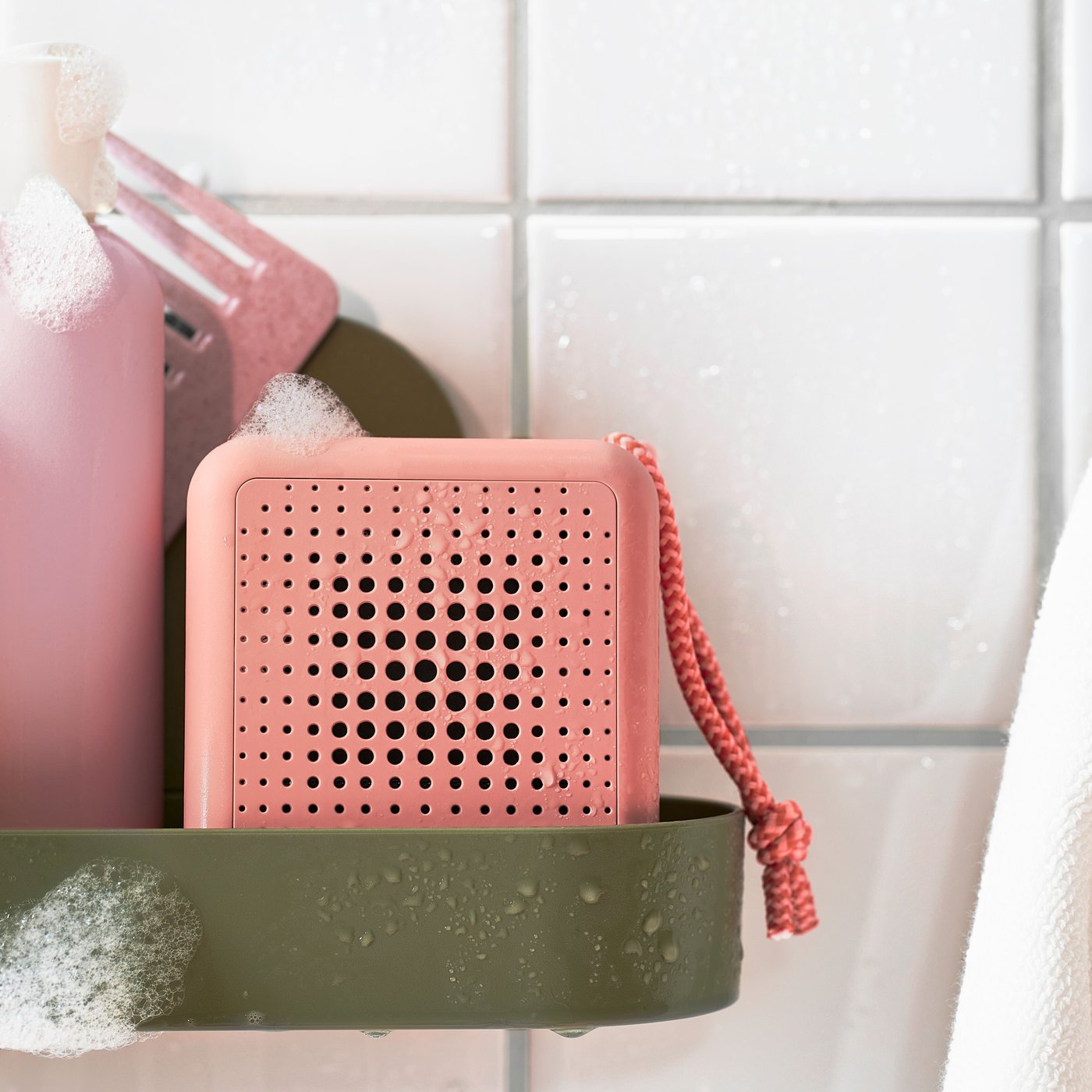 A waterproof/pink VAPPEBY portable bluetooth speaker