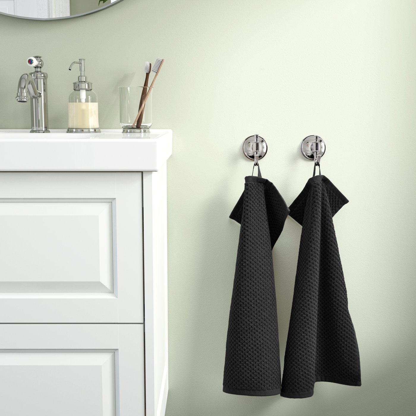 A black GULVIAL guest towel