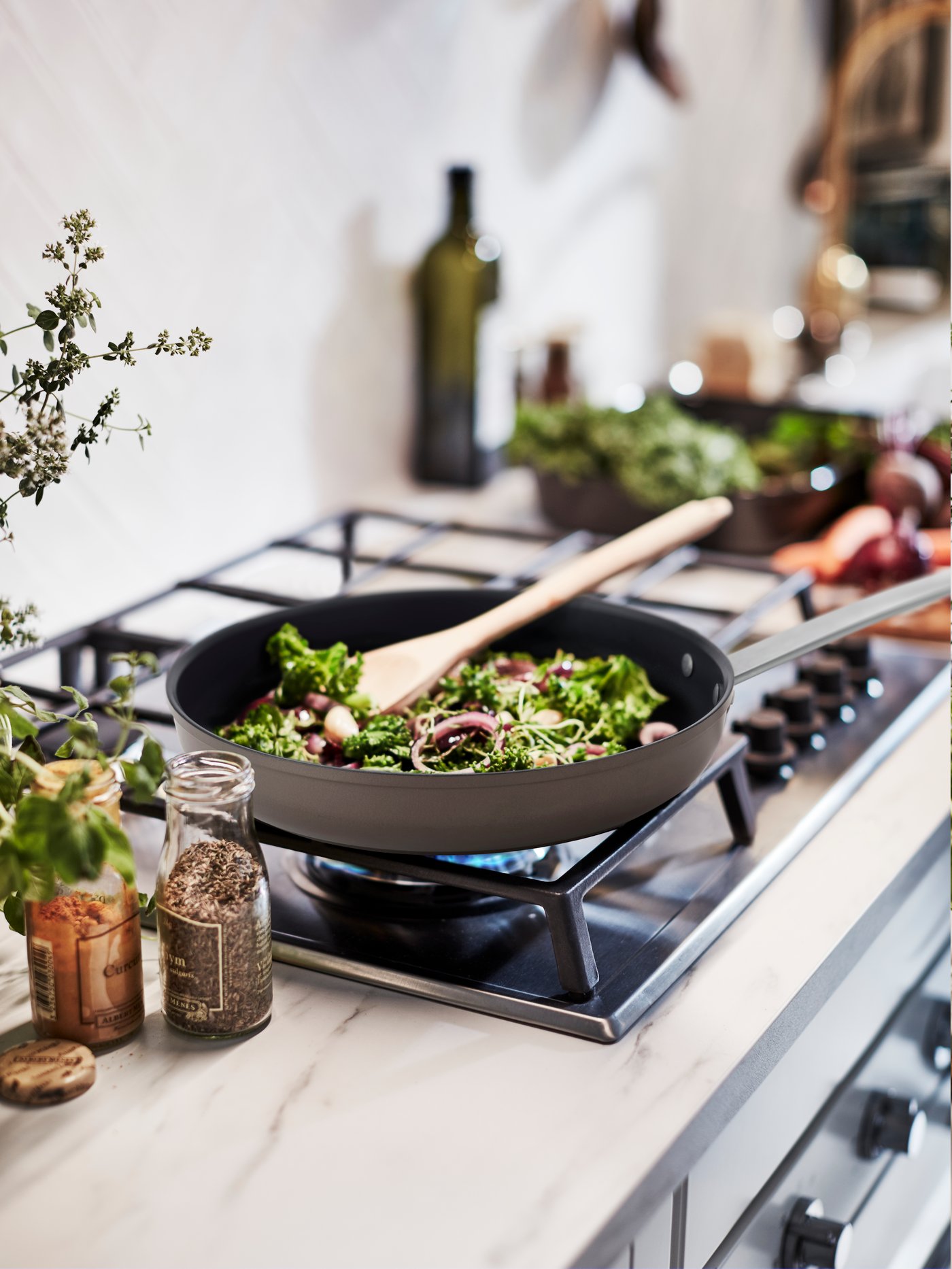 A beech RÖRT spoon in the kitchen.