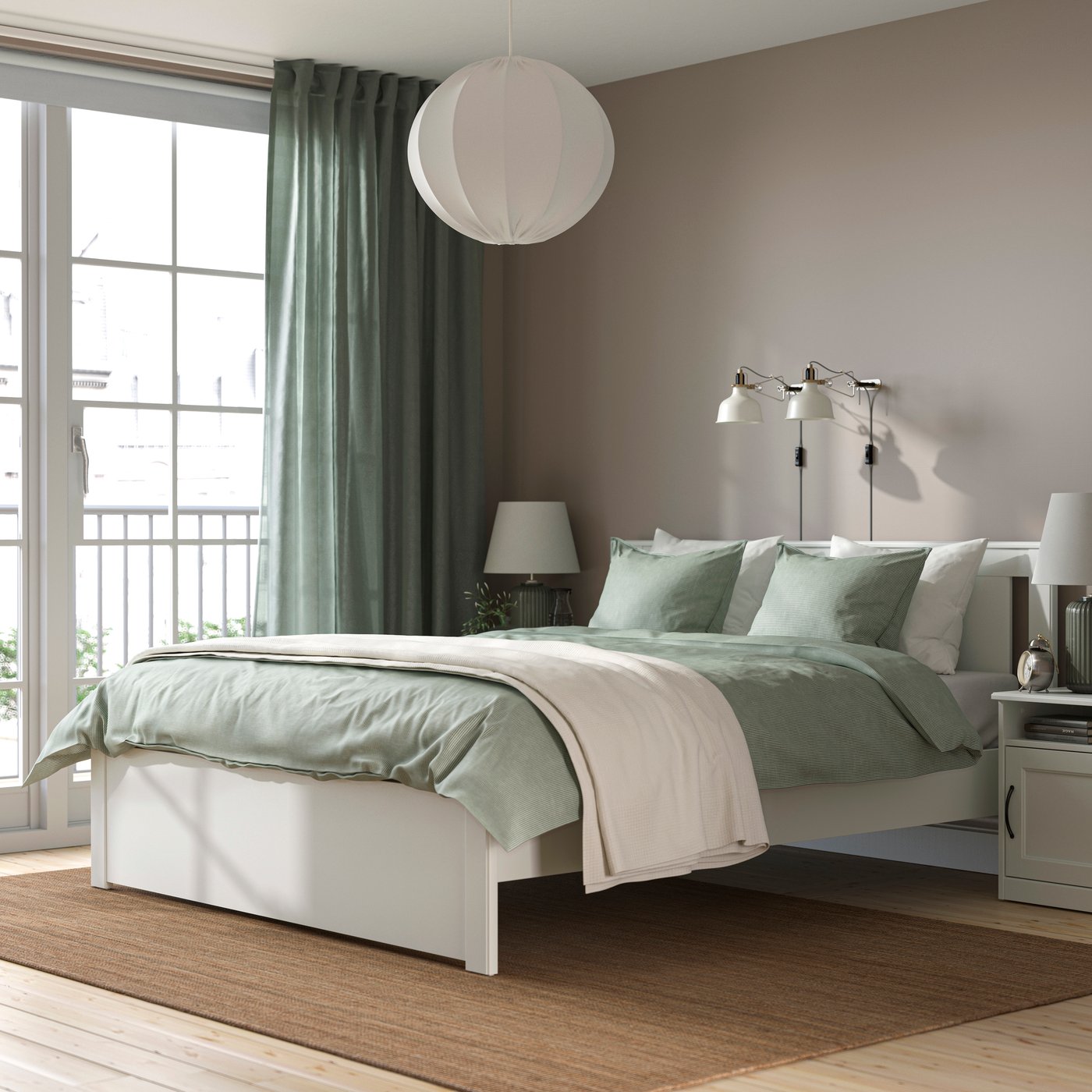 A white SONGESAND bed frame