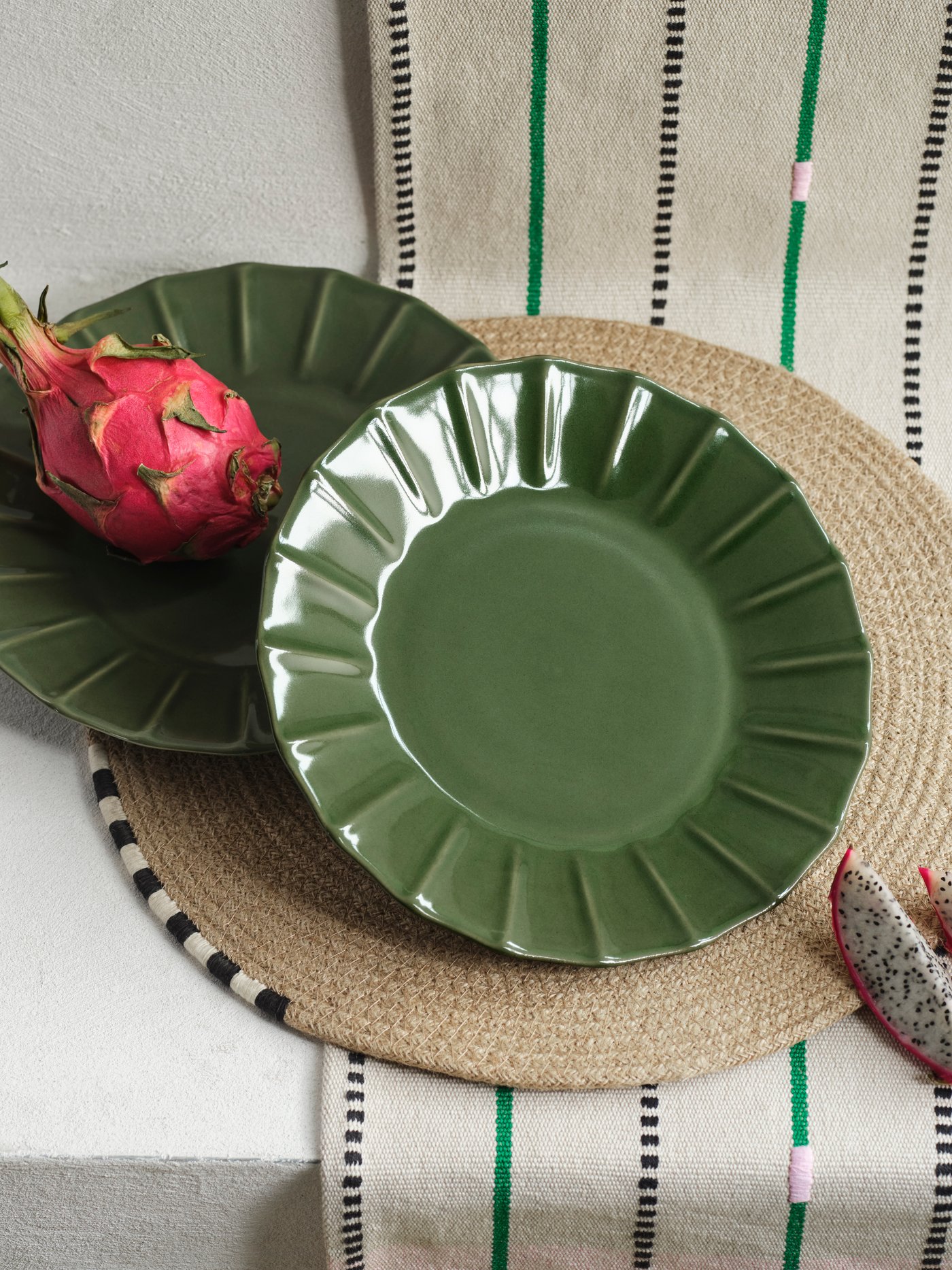 A green MÄVINN plate