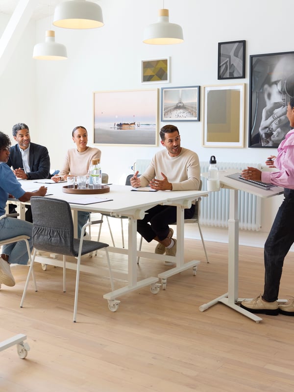 A white MITTZON foldable table with castors
