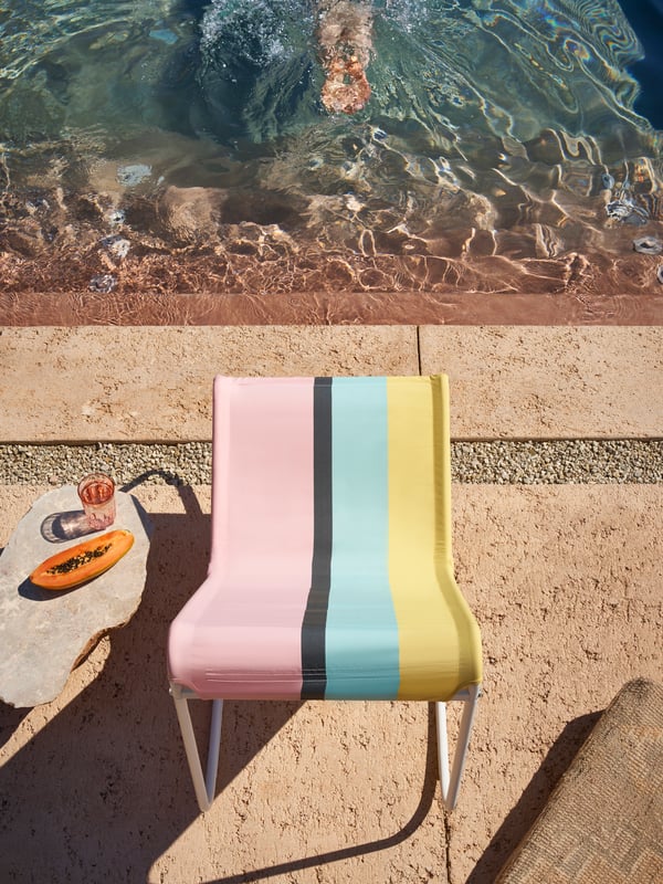 A white/multicolour TUMHOLMEN rocking-chair, in/outdoor