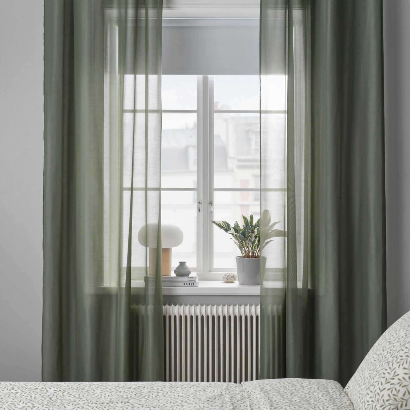 A green/with heading tape STENFRÖ sheer curtains, 1 pair in the bedroom
