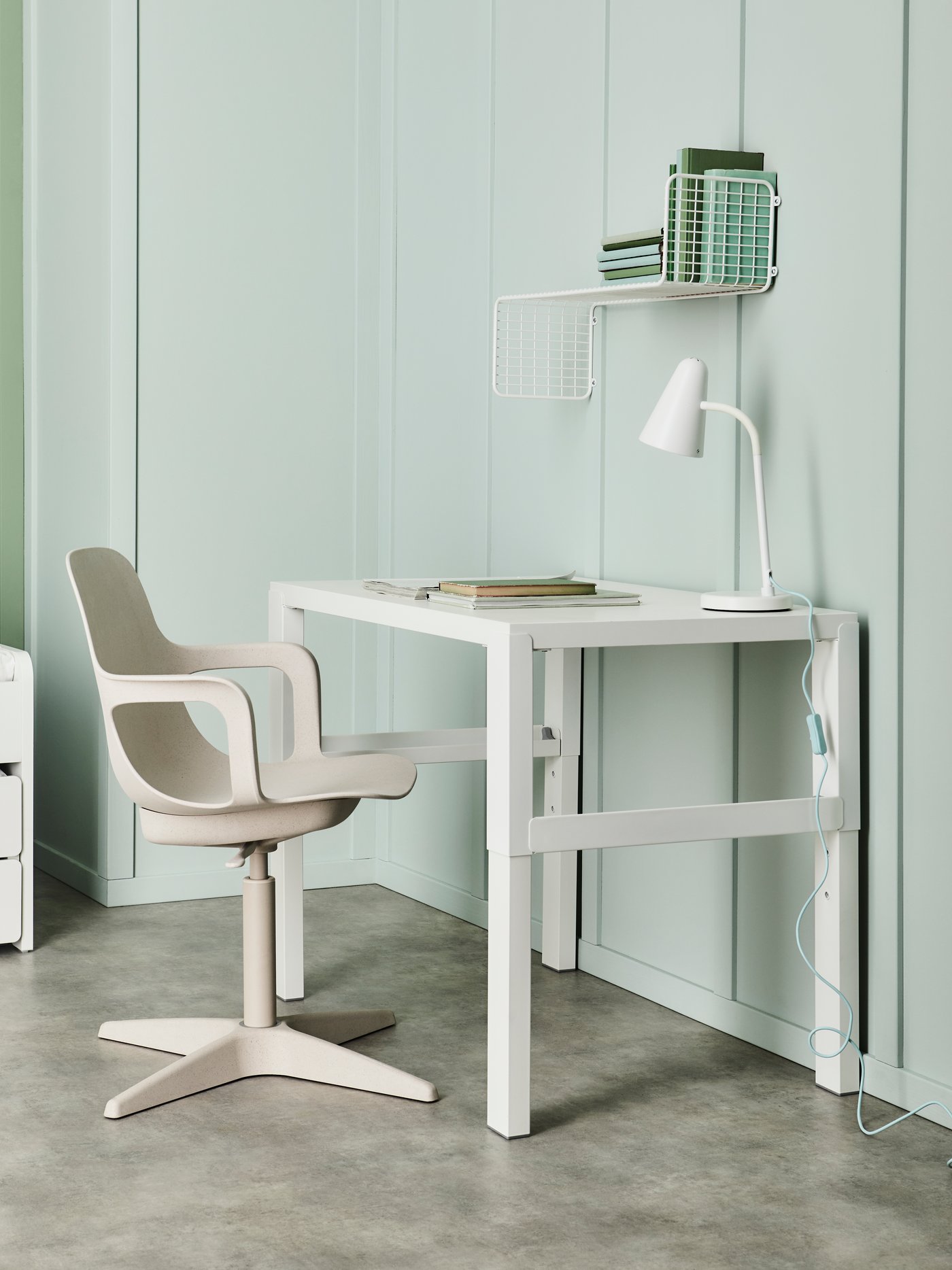 A white FUBBLA LED work lamp in the home office