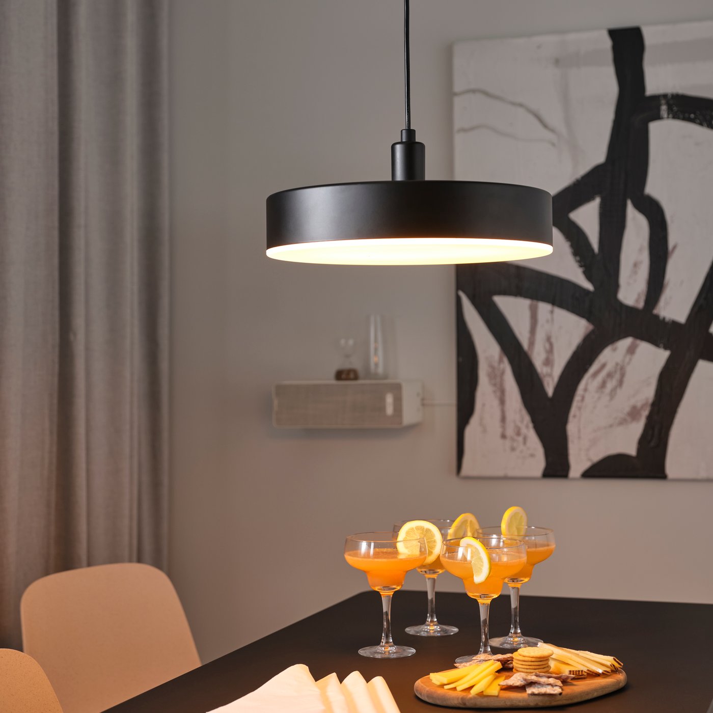 A wireless dimmable white spectrum/anthracite NYMÅNE LED pendant lamp