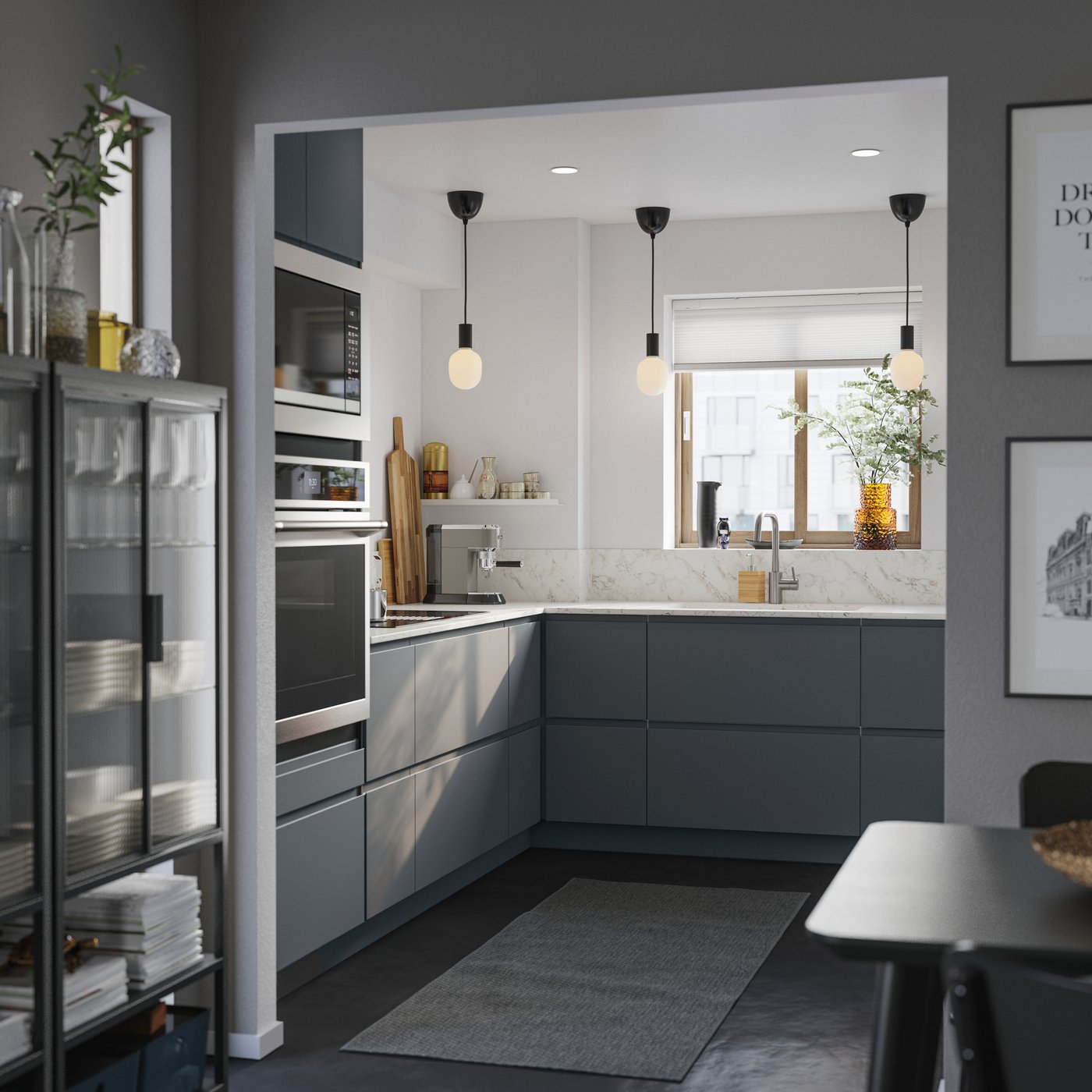 A dark gray VOXTORP drawer front in the kitchen