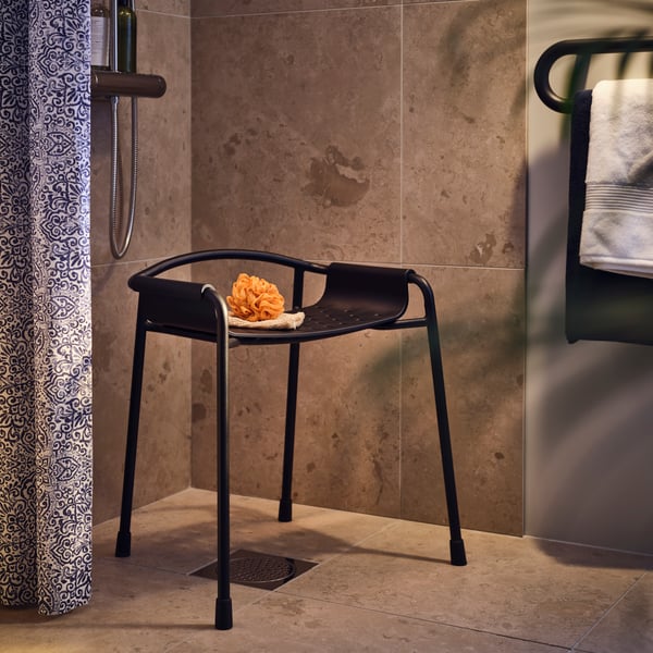 An anthracite BÄSINGEN shower chair