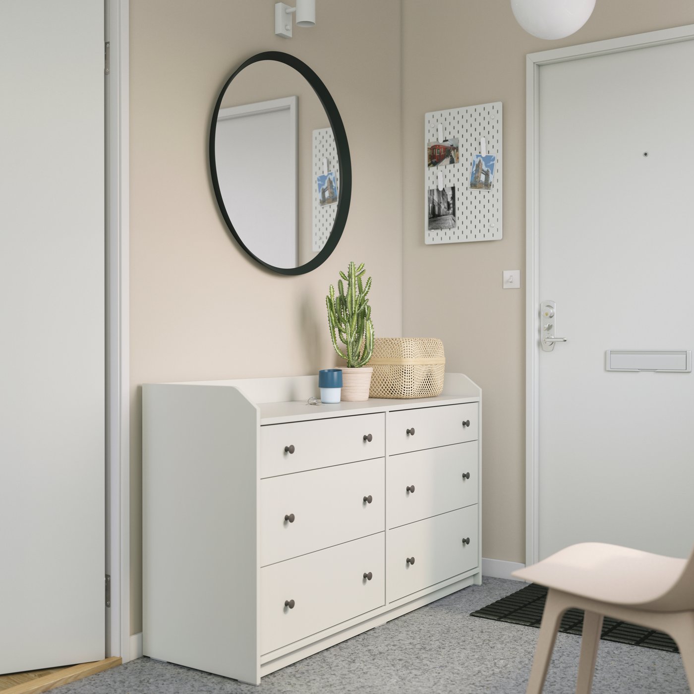 A white HAUGA chest of 6 drawers