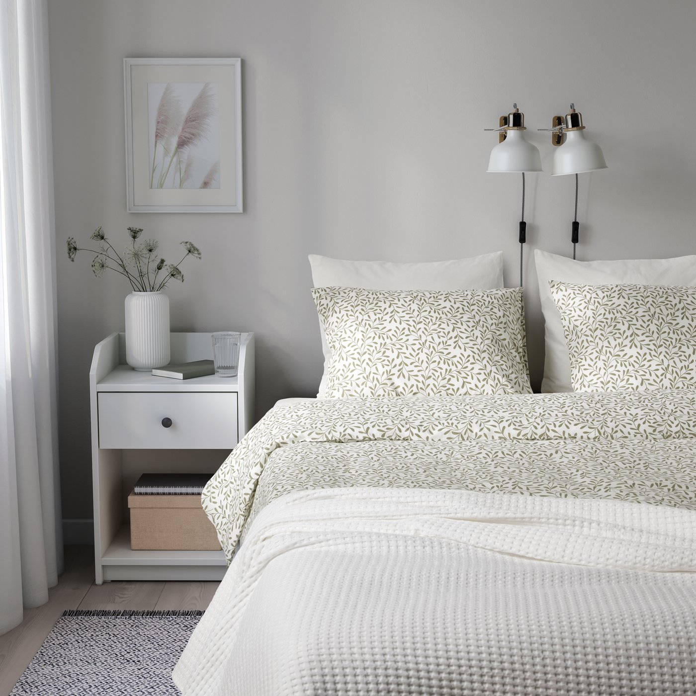 A white/green SORGMANTEL duvet cover and 2 pillowcases