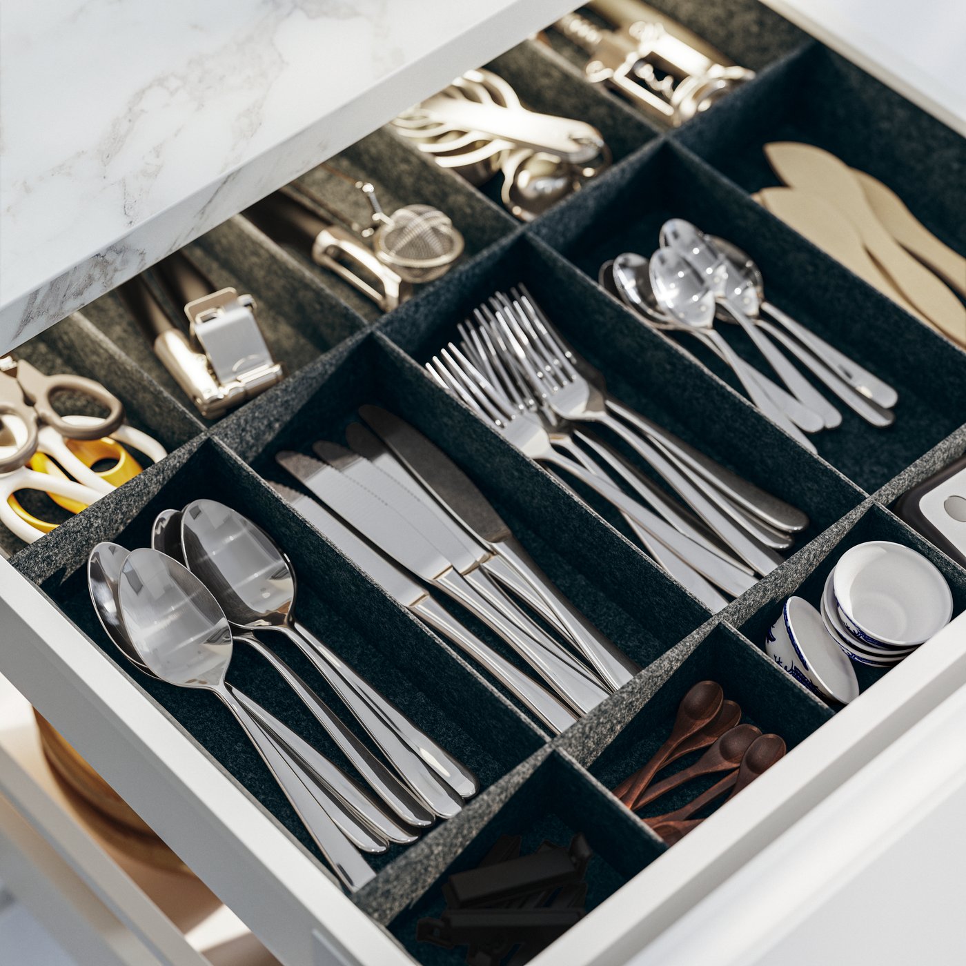 A stainless steel MARTORP 30-piece cutlery set in the kitchen