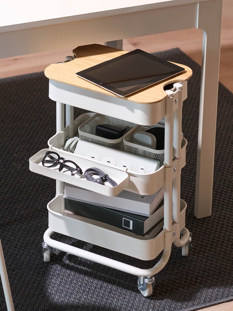 A white RÅSKOG trolley with lid