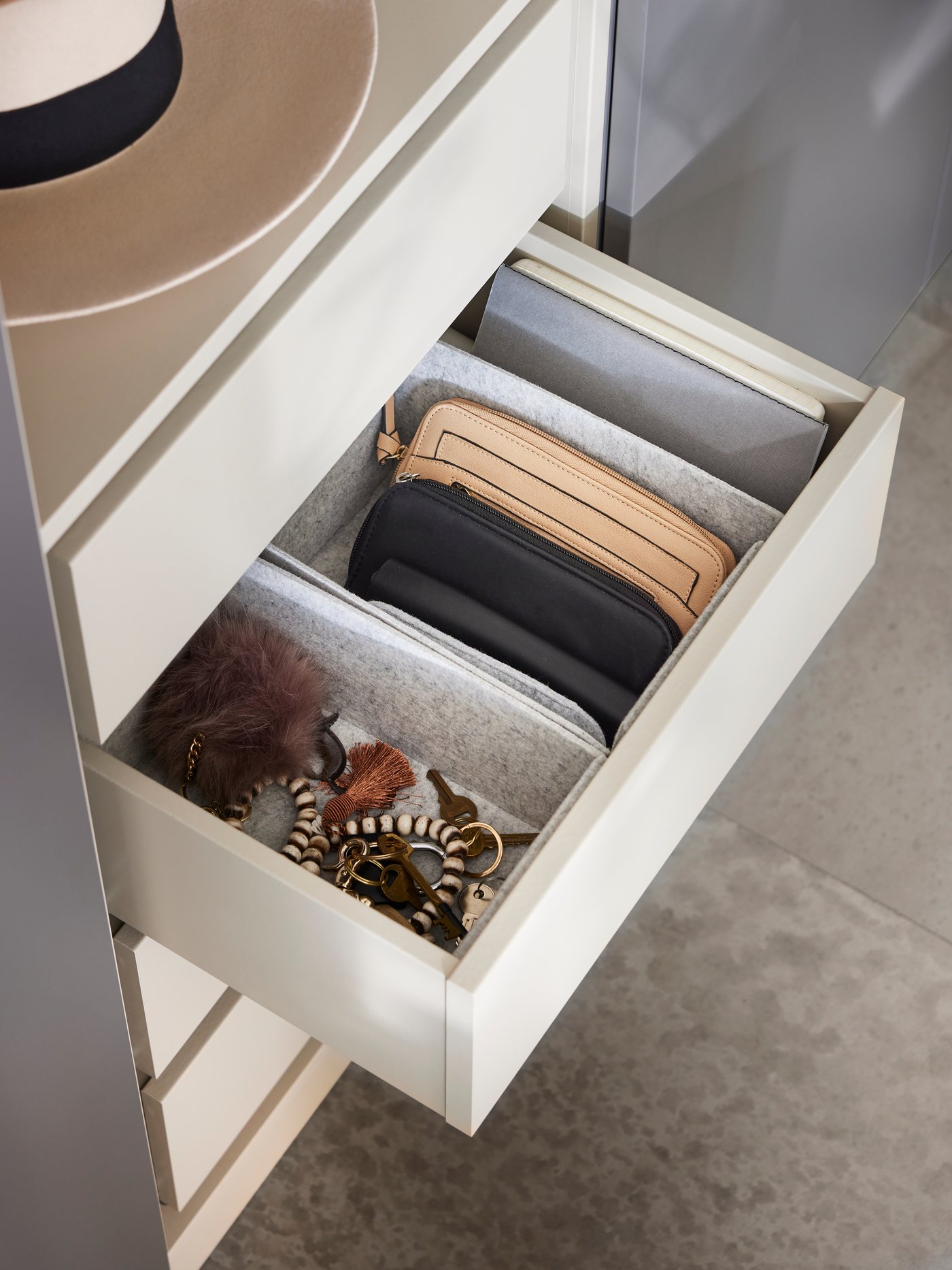 A grey-beige KOMPLEMENT drawer