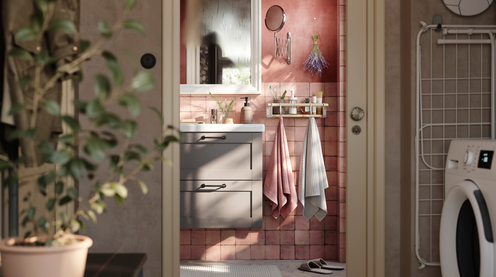 A light pink VINARN hand towel