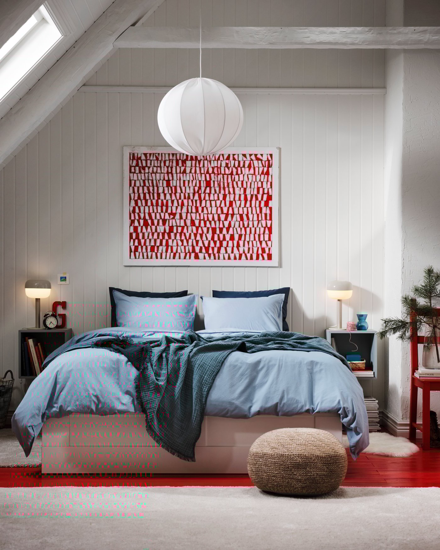 A light grey-blue EKET cabinet in the bedroom