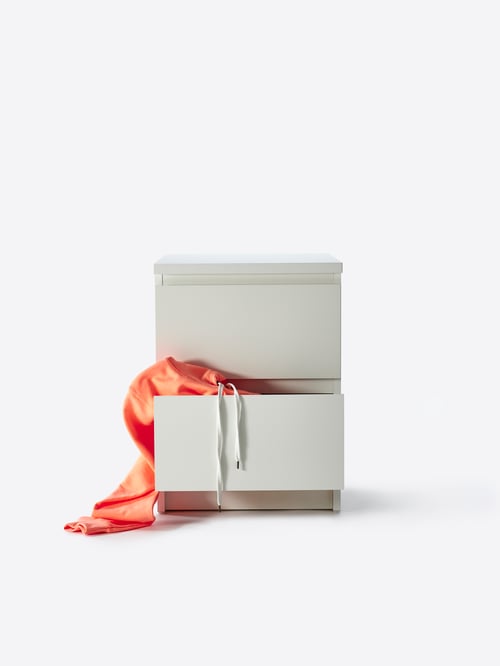 Bedroom featuring a white MALM chest of 2 drawers made of particleboard with two drawers with pull-out stop.