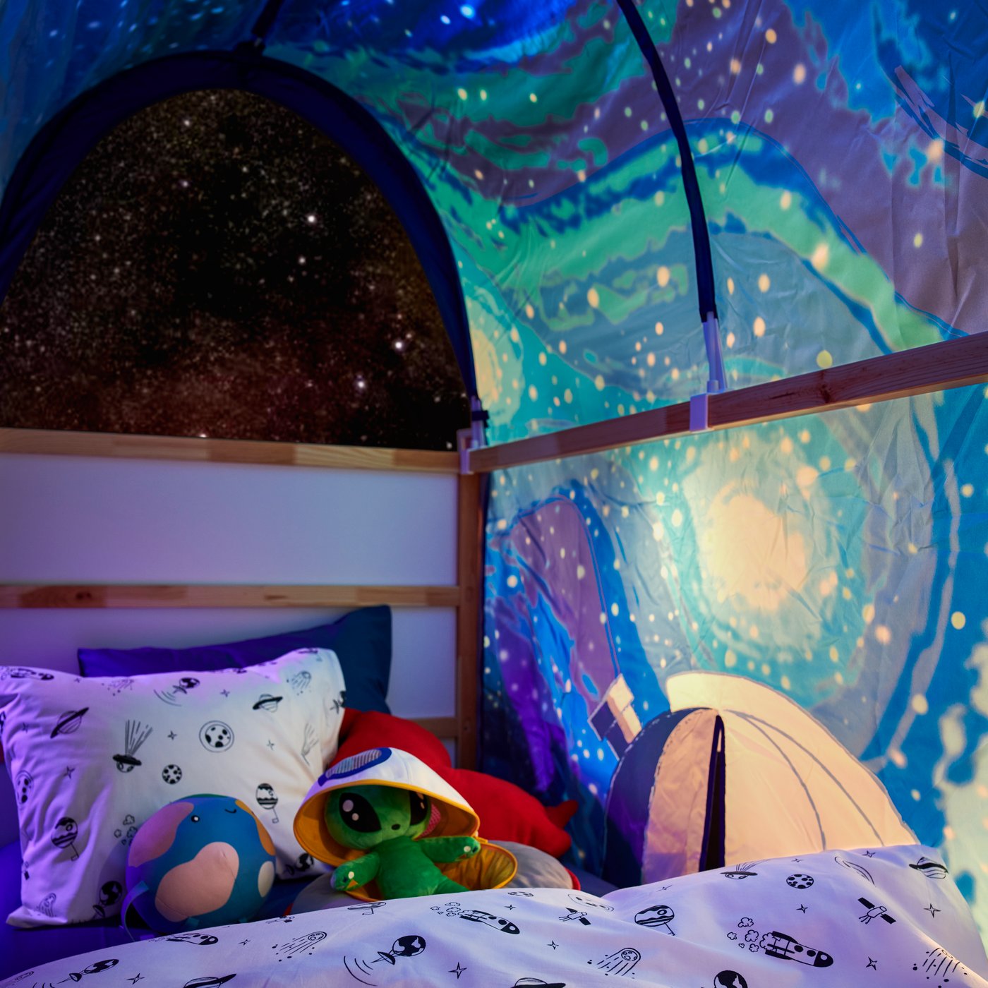 A space white/black AFTONSPARV duvet cover and pillowcase in the childrens room