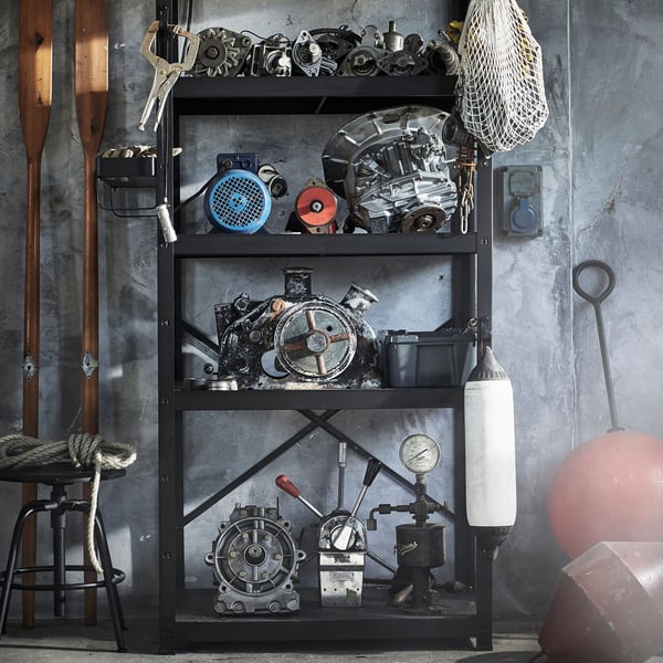 BROR heavy duty shelving system in the garage and storeroom with various mechanical parts placed on each shelf. 