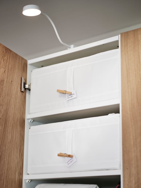 A white/dimmable YTBERG cabinet lighting in the bedroom