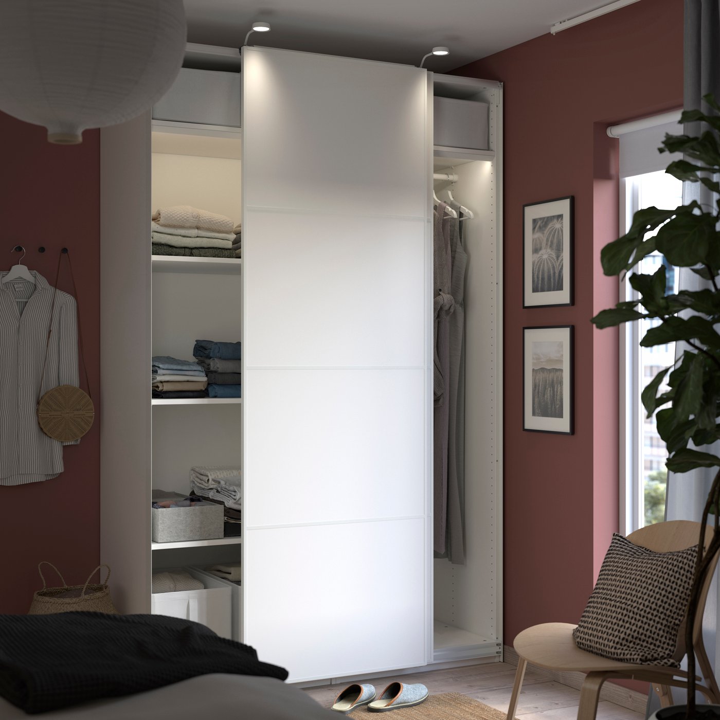 A white/double sided white PAX wardrobe in the bedroom