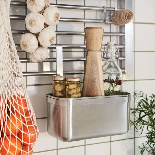 A clear glass KORKEN bottle with stopper in the kitchen