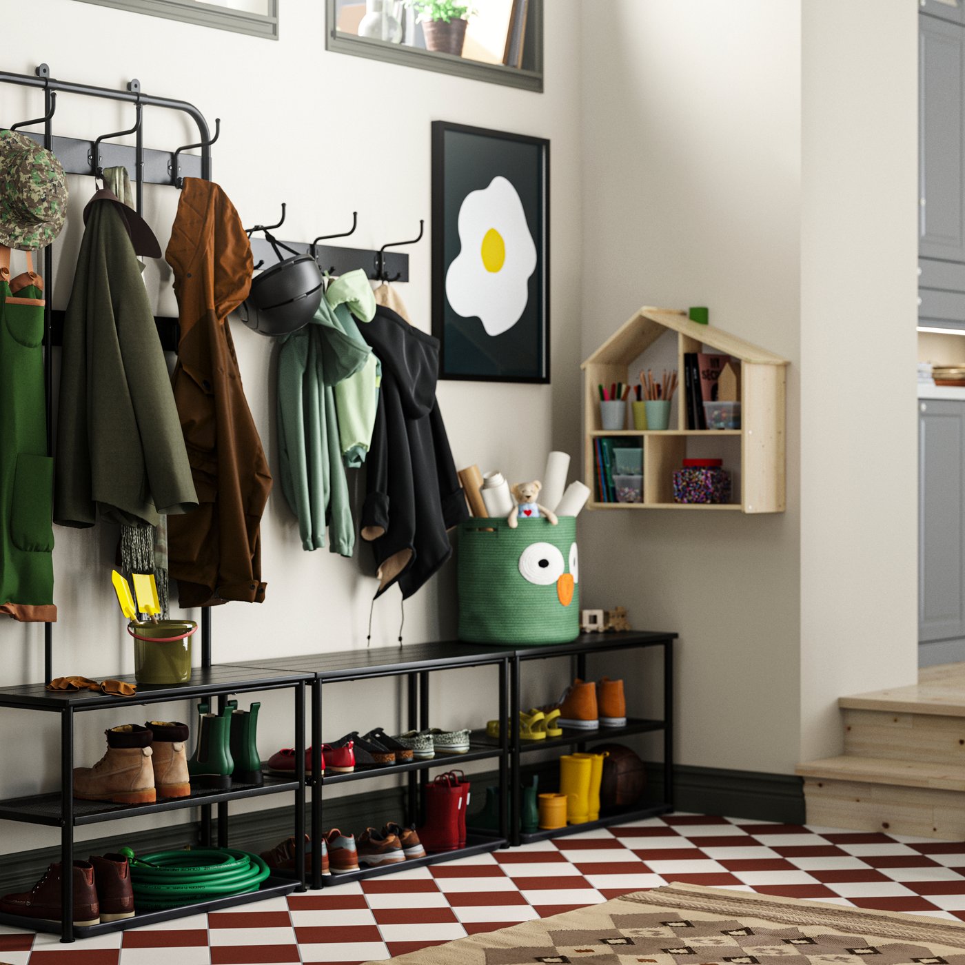 Veliki hodnik sa stepenicama koje vode u kuhinju. NIPÅSEN čiviluk za kapute i klupe, kao i radna klupa uza zidove.