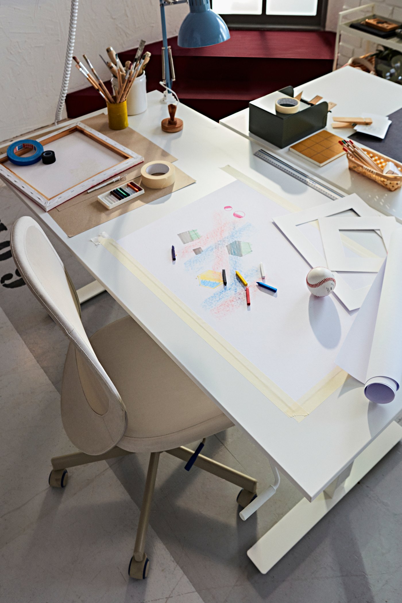 A light blue TERTIAL work lamp