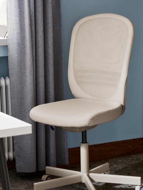 Workspace close-up of a beige office chair with lockable tilt tension mechanism and adjustable height.
