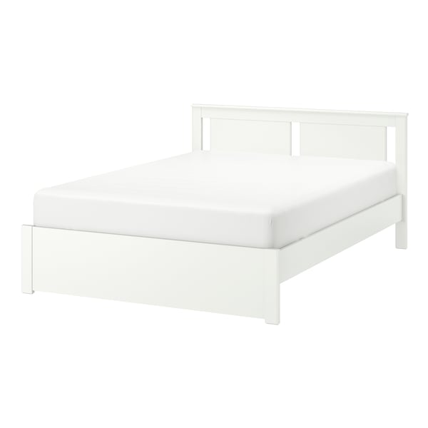 A white SONGESAND bed frame in the NA