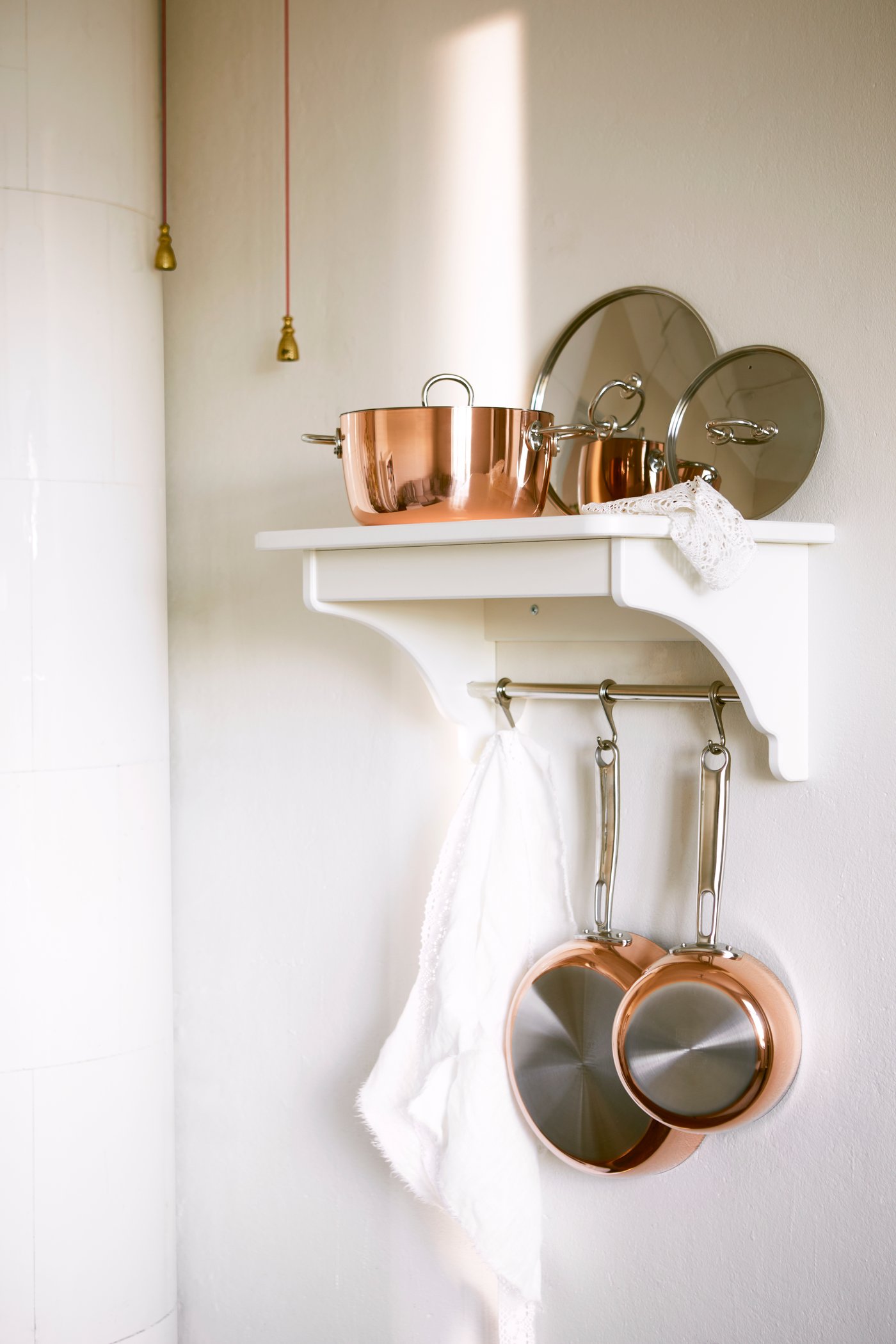 A copper/stainless steel FINMAT saucepan with lid