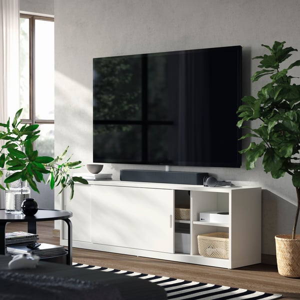 An off-white TONSTAD TV bench