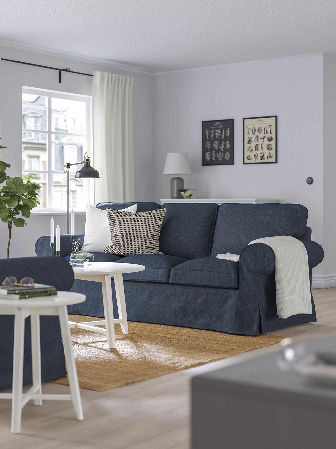 A Kilanda dark blue EKTORP 3-seat sofa